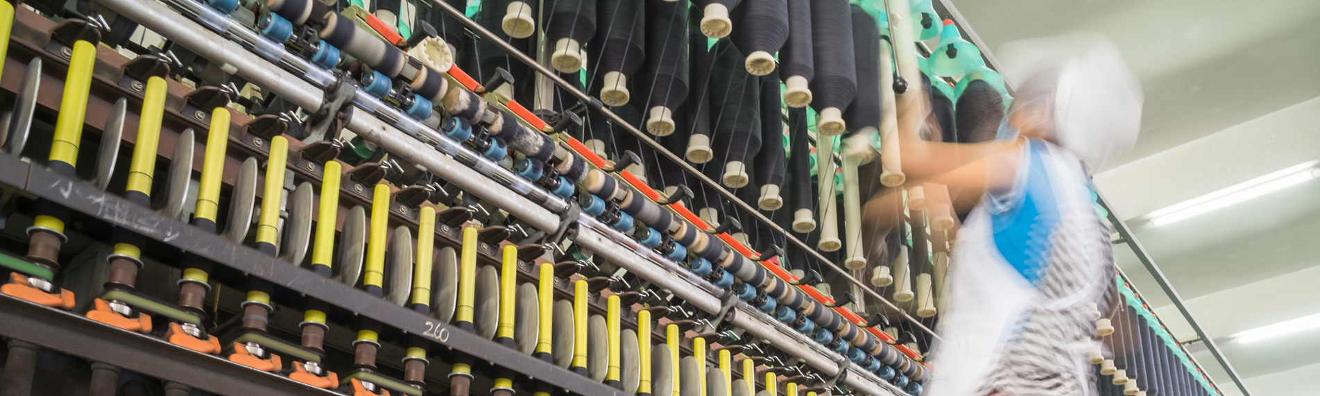Humidification and humidity control in textile manufacturing